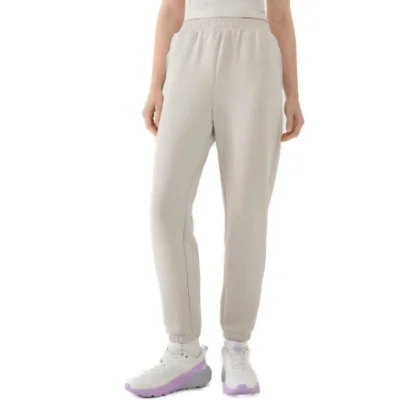 Dámske tepláky 4F TROUSERS CAS F1010-83S-BEIGE