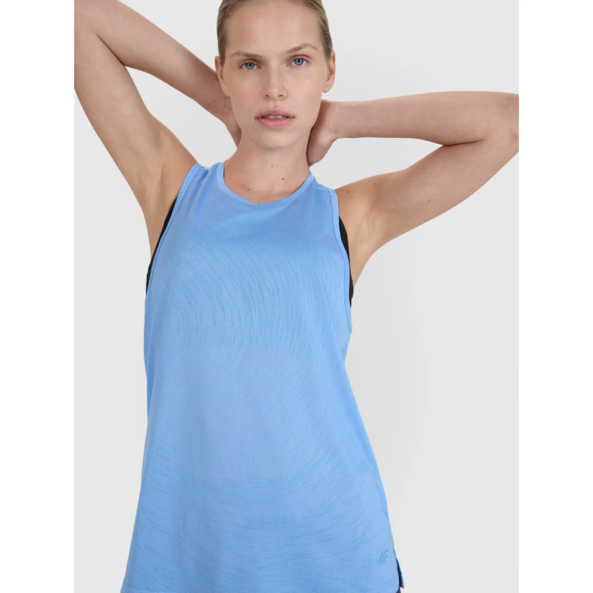 Dámske bežecké tričko bez rukávov 4F SLEEVELESS FNK-WSS25TFSLF427-33S-BLUE · záber 2