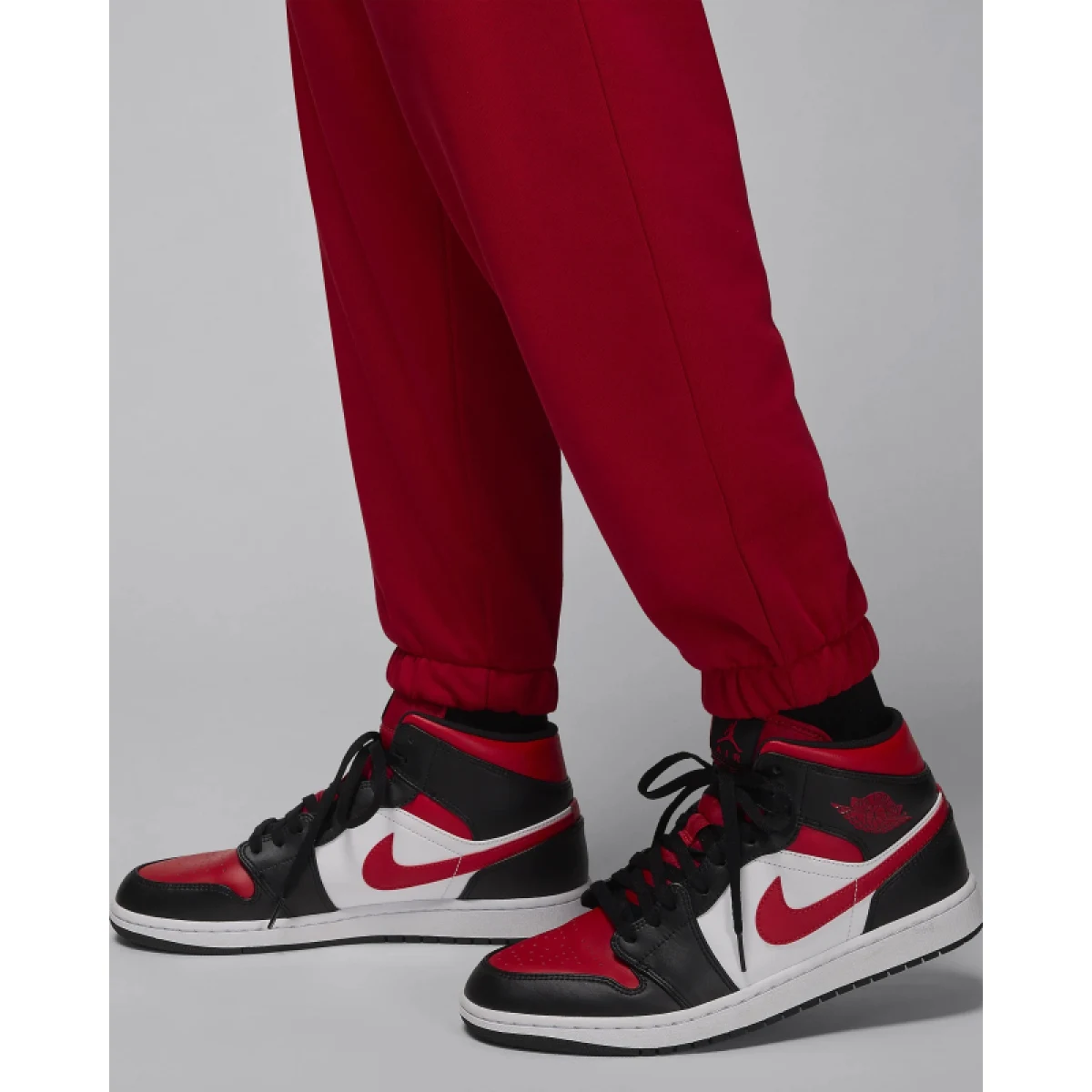 Pánske zateplené tepláky NIKE JORDAN DF SPRT CSVR FLC PANT-687 GYM RED BLACK · záber 5