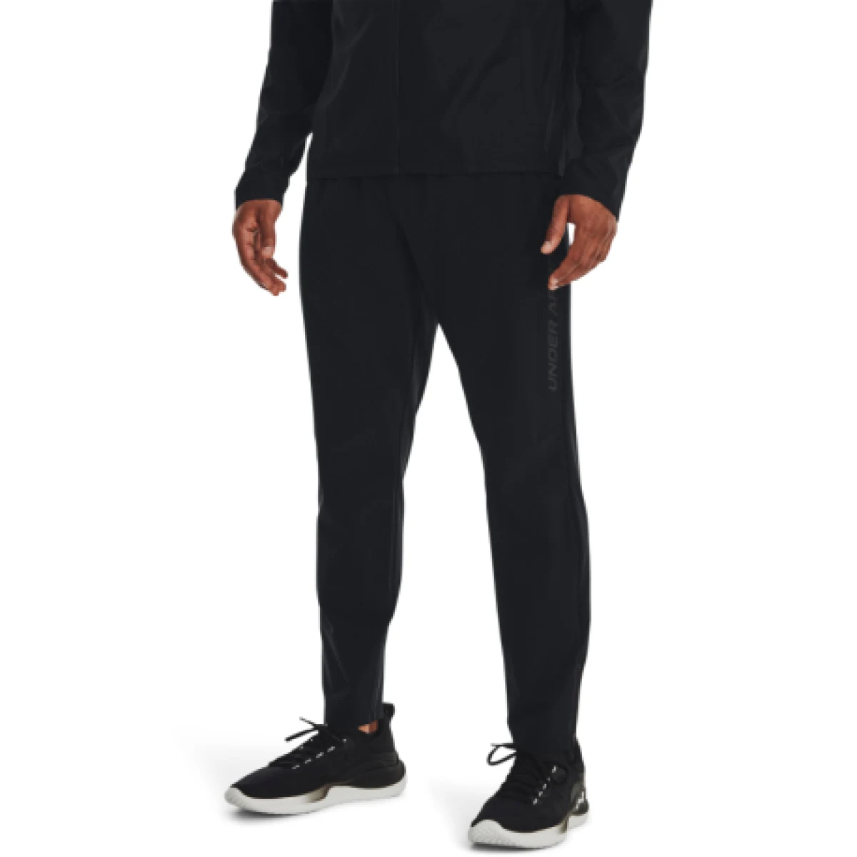 Pánske tréningové nohavice UNDER ARMOUR UA STORM RUN PANTS-BLK · záber 1