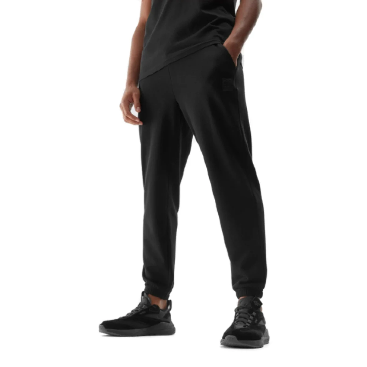 Pánske tepláky 4F TROUSERS-AW23TTROM453-20S-DEEP BLACK · záber 1