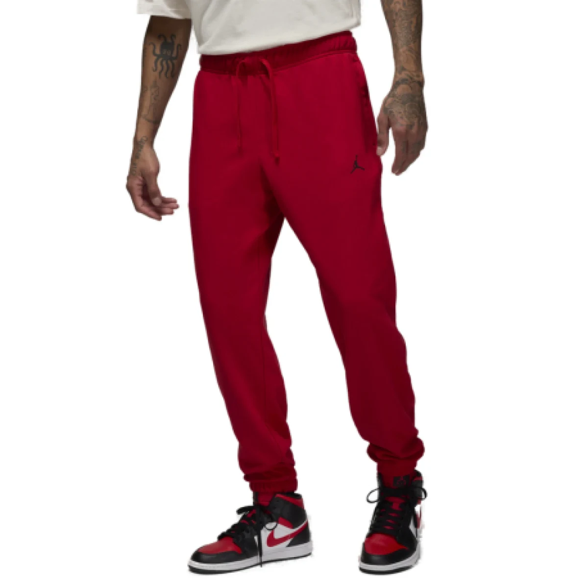 Pánske zateplené tepláky NIKE JORDAN DF SPRT CSVR FLC PANT-687 GYM RED BLACK · záber 1